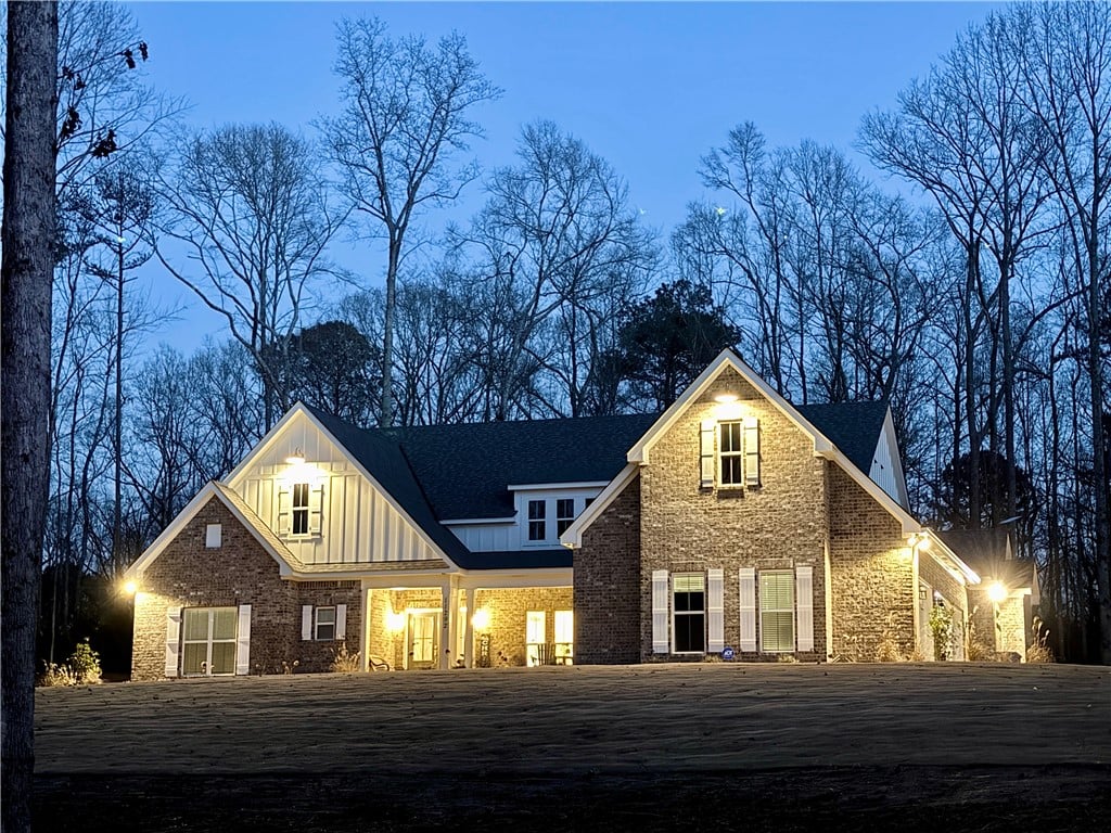 11292 Lee Rd 188, Waverly, AL 36879, Gable rooflines and classic brick cladding define