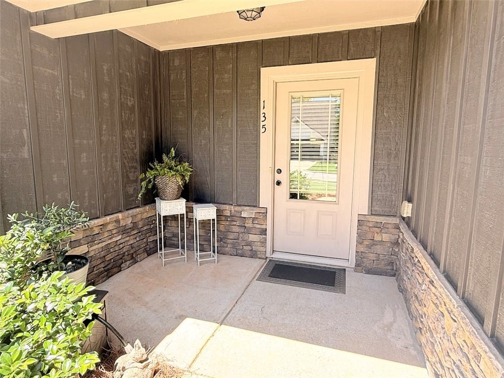 135 Denali Ln, Auburn, AL 36832, The welcoming entryway features durable siding and