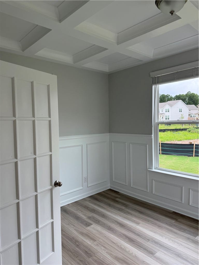 2149 Covey Dr, Waverly, AL 36879, Elegant wall paneling and sleek wood flooring defi