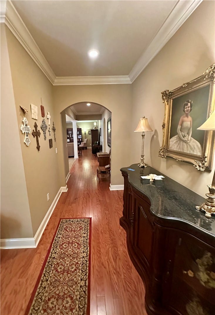 2281 Barkley Crest Ln, Auburn, AL 36830, Rich hardwood floors guide the eye through an arch