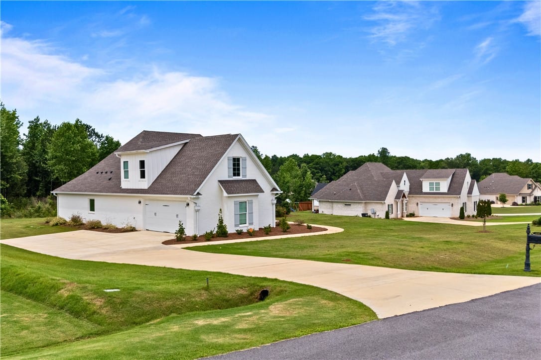 3540 Tyler Ct, Opelika, AL 36801, An oversized driveway provides ample space.