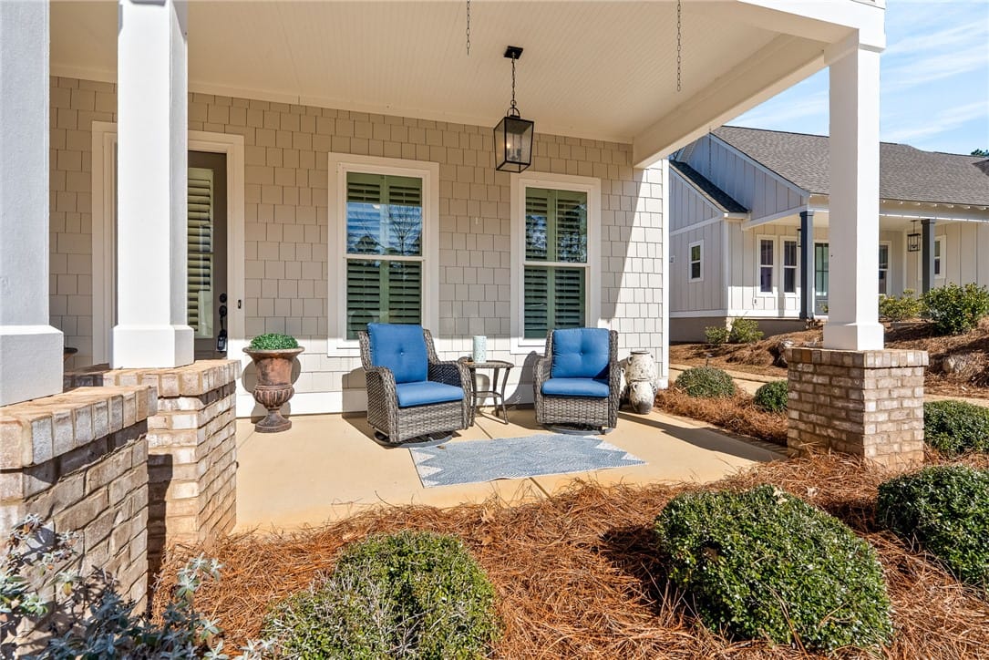 3470 Eagle Trl, Opelika, AL 36801, A welcoming covered porch with ample seating offer