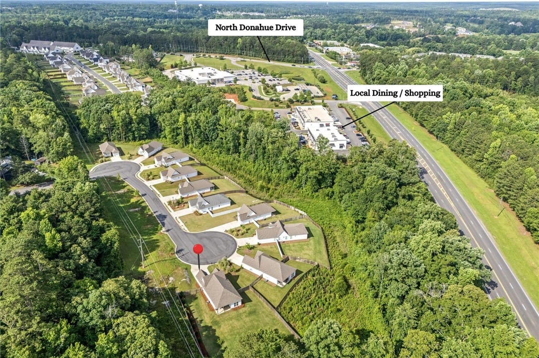 569 N Cedarbrook Dr, Auburn, AL 36830, An aerial perspective showcases a vibrant communit