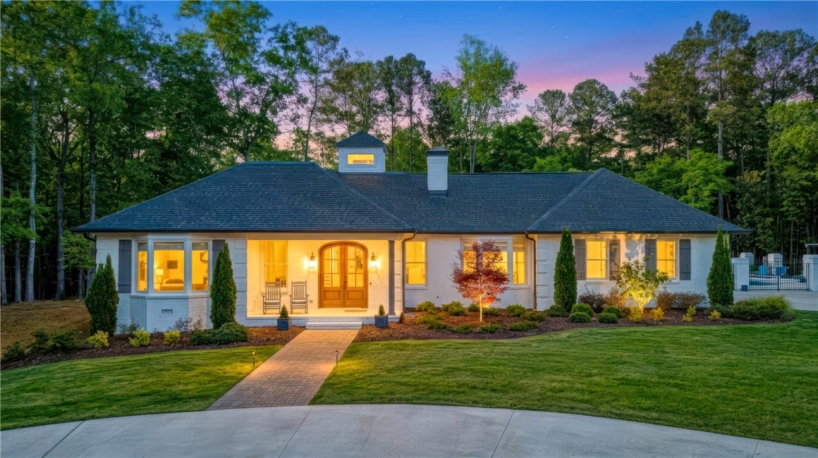 2140 White Oak Ln, Auburn, AL 36830, USA, A graceful home framed by mature trees, features a