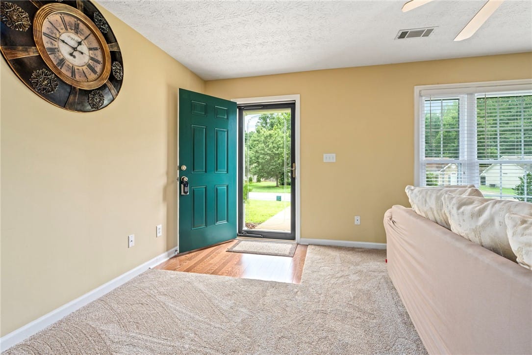 2113 Cobblestone Dr, Opelika, AL 36804, A welcoming entry area with a teal door opens to r