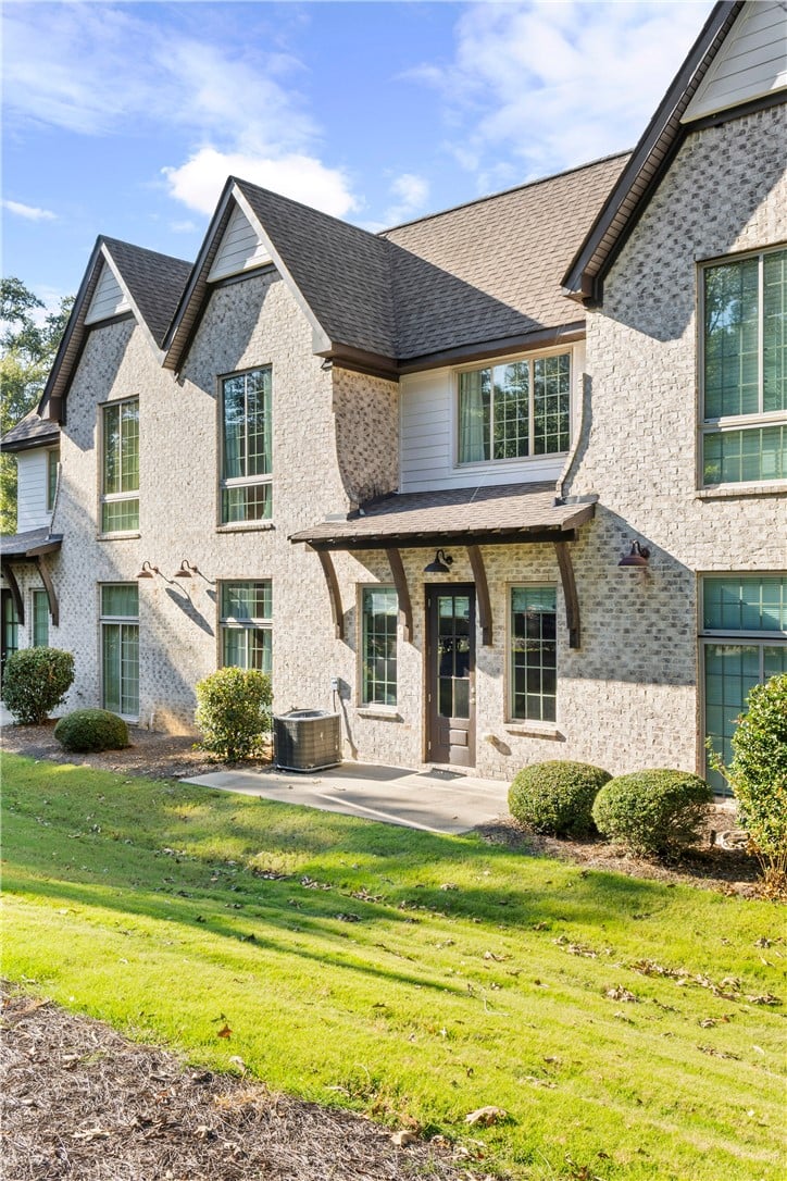 1718 W Farmville Rd, Auburn, AL 36830, Timeless brick exterior detailing meets multiple g