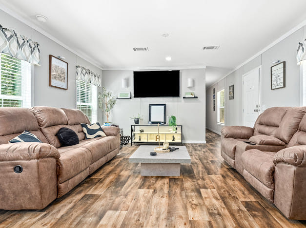 87 Dusty Rd, Tallassee, AL 36078, This relaxed living space features rich wood-look