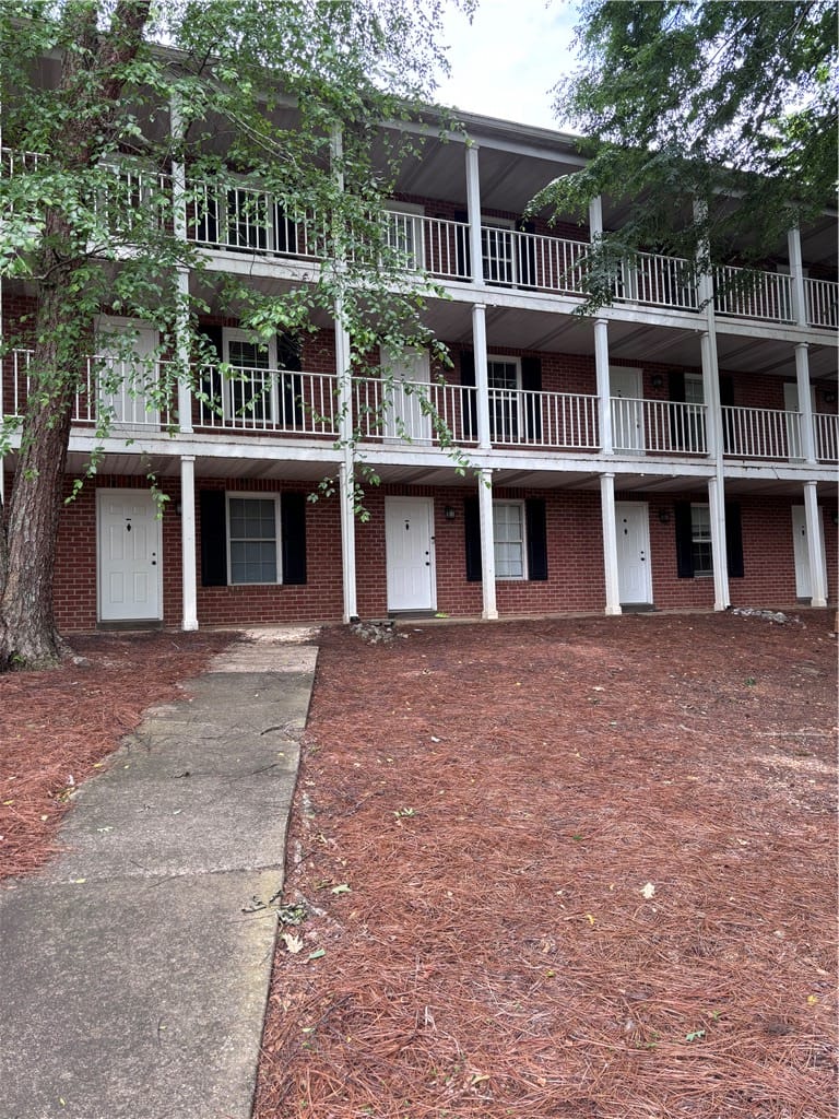 144 E University Dr k106, Auburn, AL 36832, Multi-level brick facade with multiple units, each