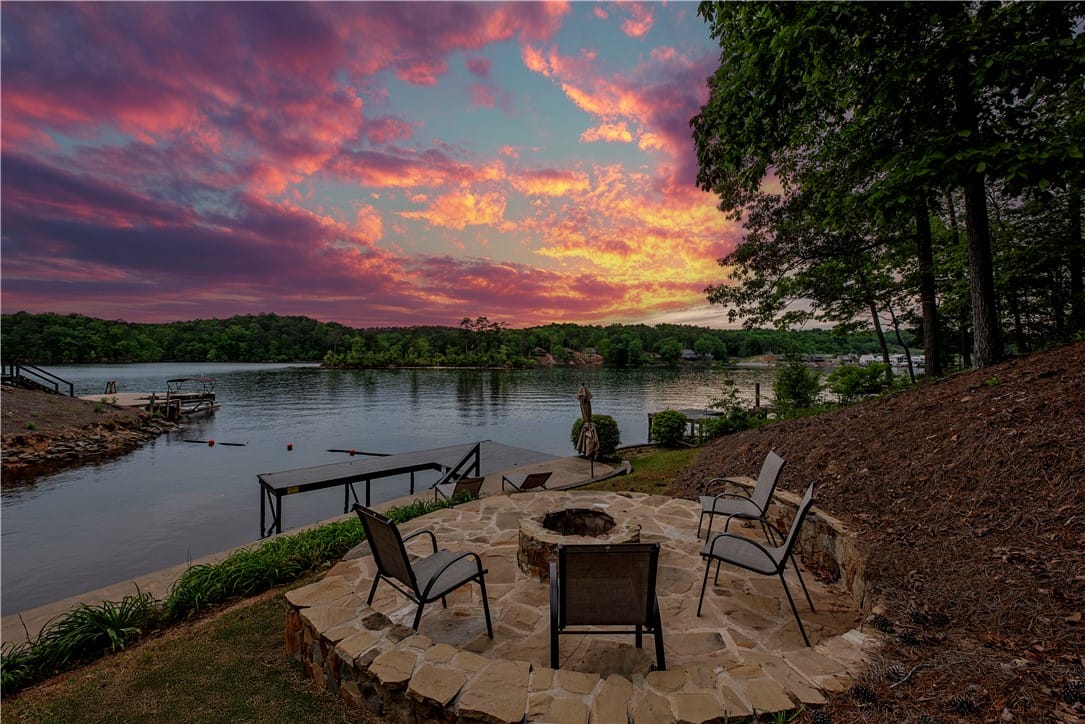 5 Riverwood Ln, Alexander City, AL 35010, This lakeside setting offers a built-in fire pit,