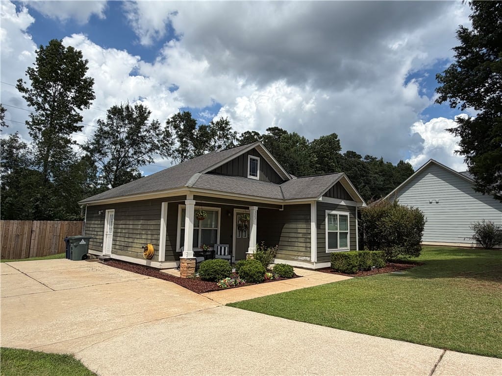 323 Embry Ln, Auburn, AL 36830, The oversized parking pad is a great asset.
