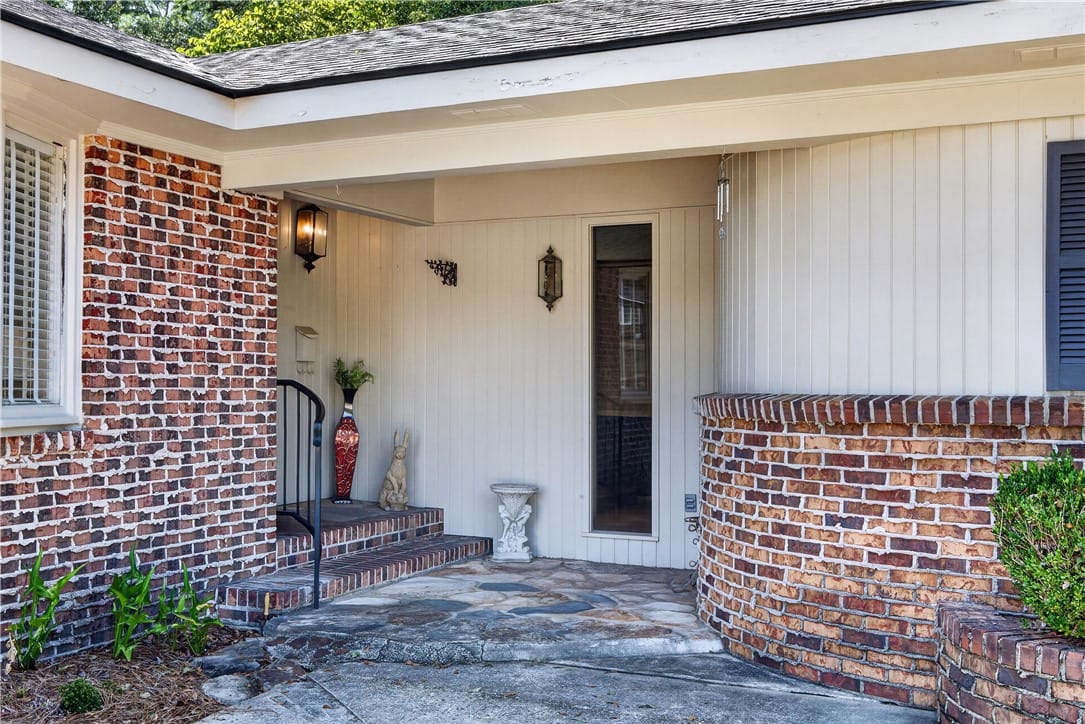 778 Brenda Ave, Auburn, AL 36830, A welcoming front entrance featuring rich brickwor