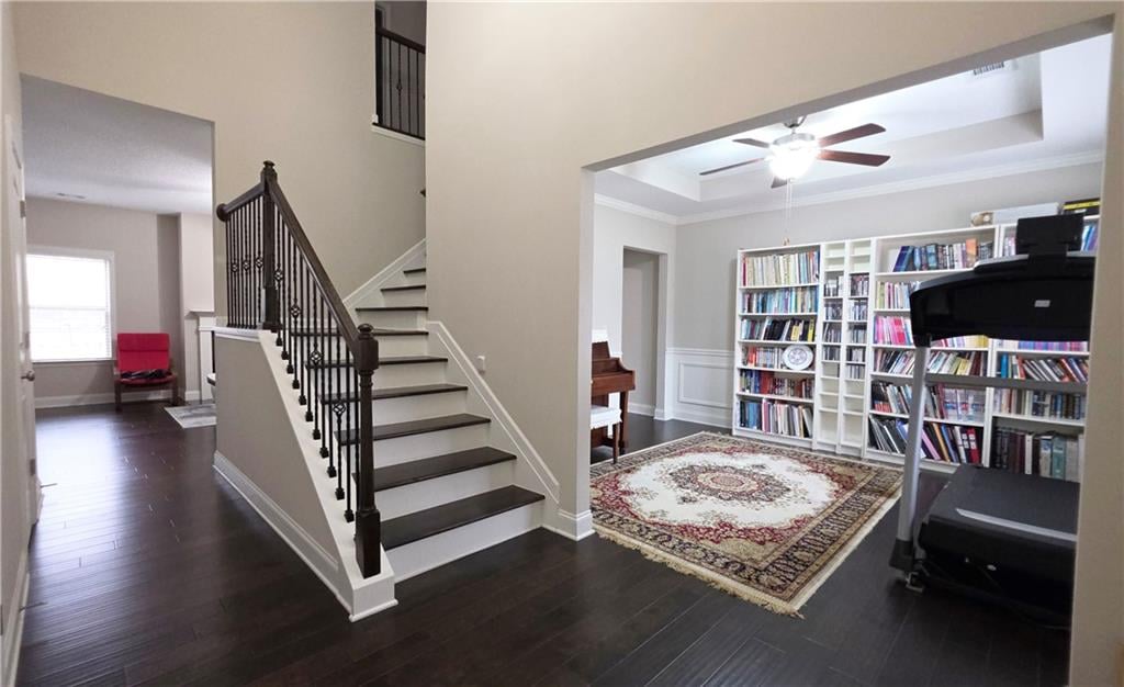 1561 N Camden Dr, Auburn, AL 36830, Rich hardwood floors and a modern staircase frame