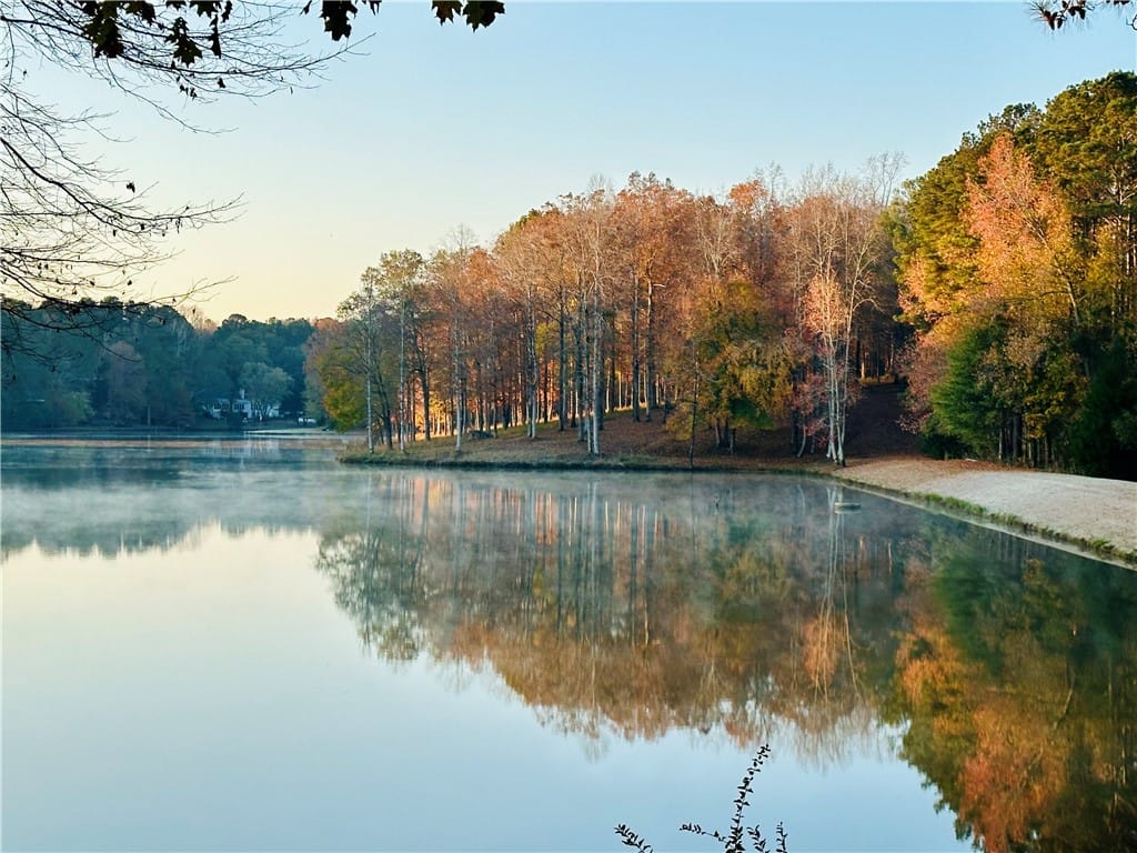 575 Cross Creek Rd, Auburn, AL 36832, Experience serene lakefront living with vibrant au