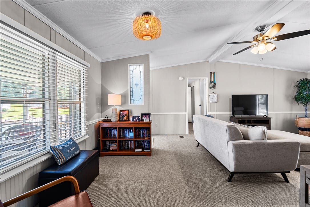 20 Windy Crest Rd, Jackson's Gap, AL 36861, A comfortable living space boasts ample natural li