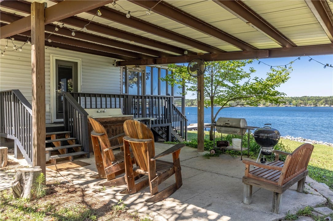 1710 Point Windy Dr, Jackson's Gap, AL 36861, A spacious covered patio invites lakeside relaxati