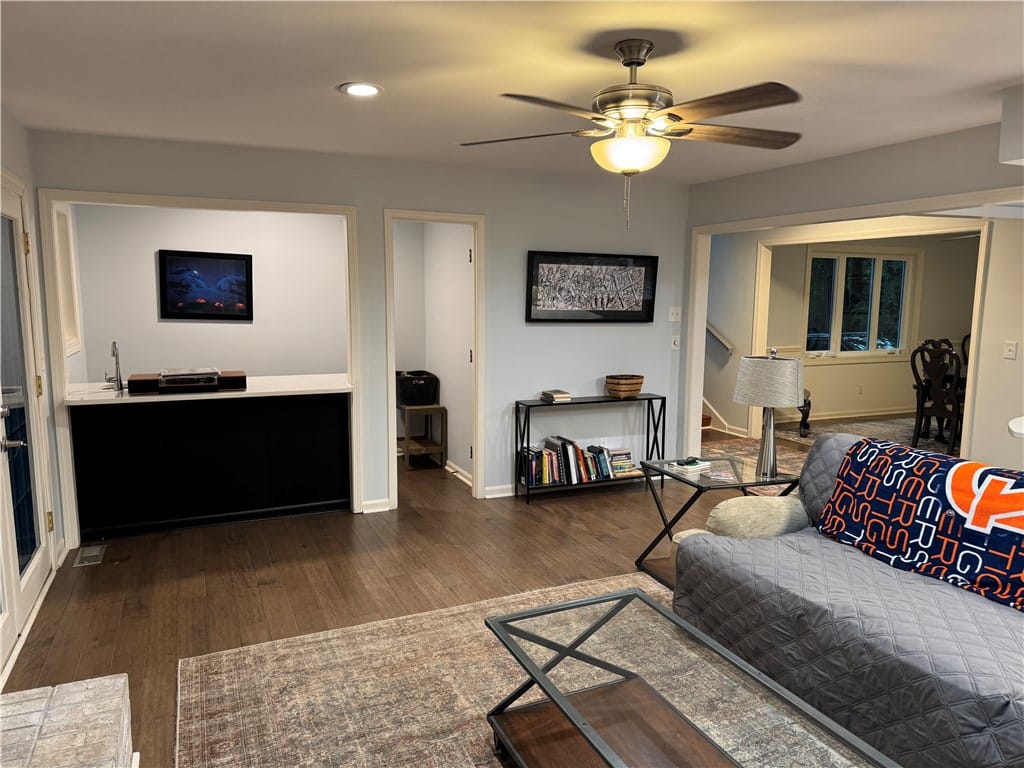 1327 Owens Rd, Auburn, AL 36830, Hardwood floors and a wet bar create an inviting e