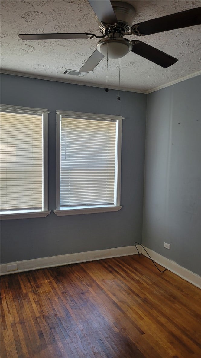 408 Brewer St, Tuskegee, AL 36083, Warm hardwood floors and classic crown molding anc