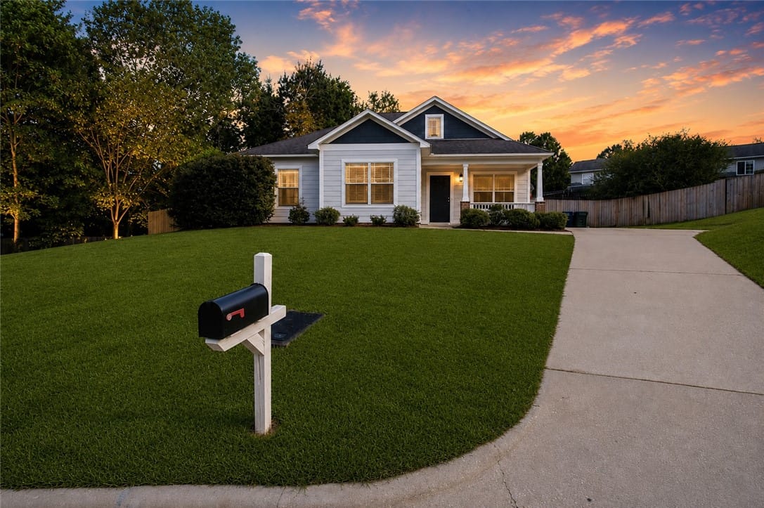 398 Embry Ln, Auburn, AL 36830, paved driveway welcome you to this inviting home