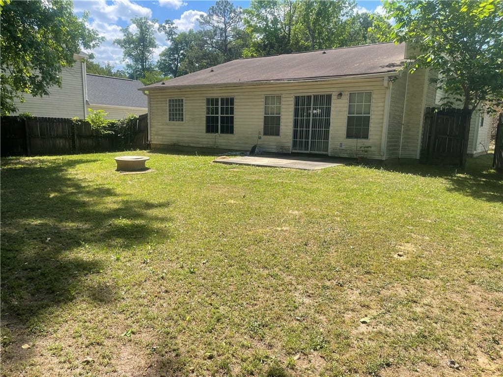 4251 CHESTNUT, Auburn, AL, 36801, A spacious backyard awaits, complete with a fire p