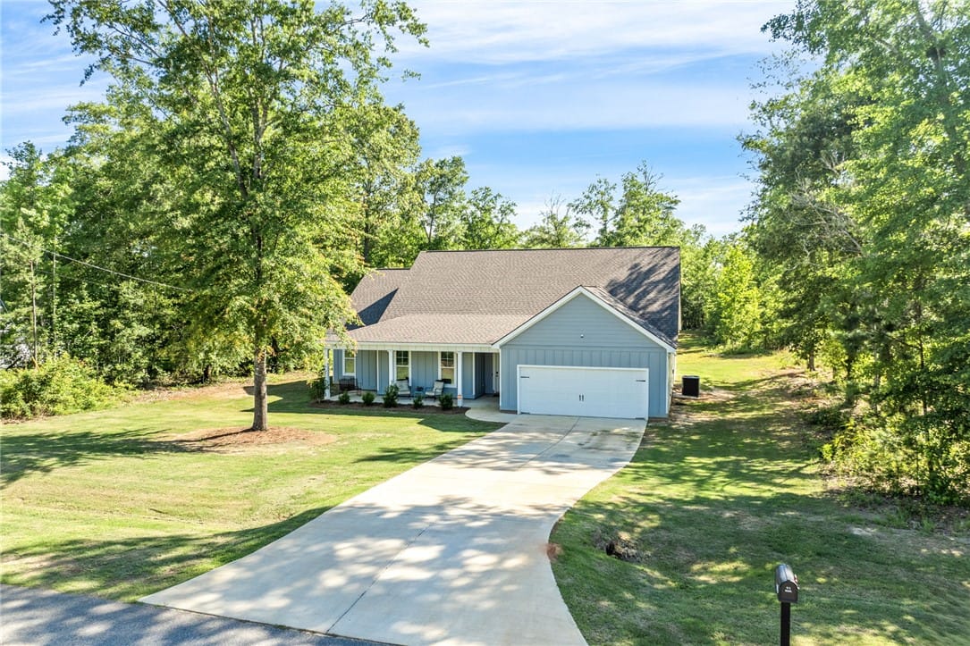 65 Lee Rd 2233, Cusseta, AL 36852, A welcoming abode nestled amongst mature trees, fe