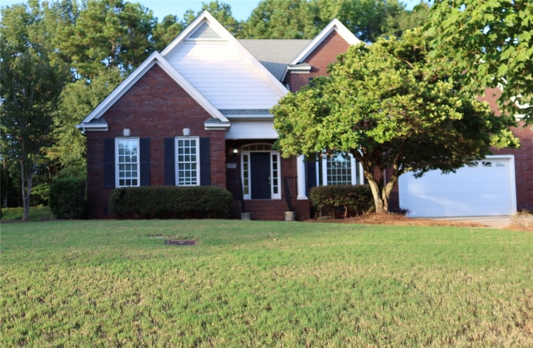 1777 Woodley Rd, Auburn, AL 36830, Stately brick construction defines this elegant ho