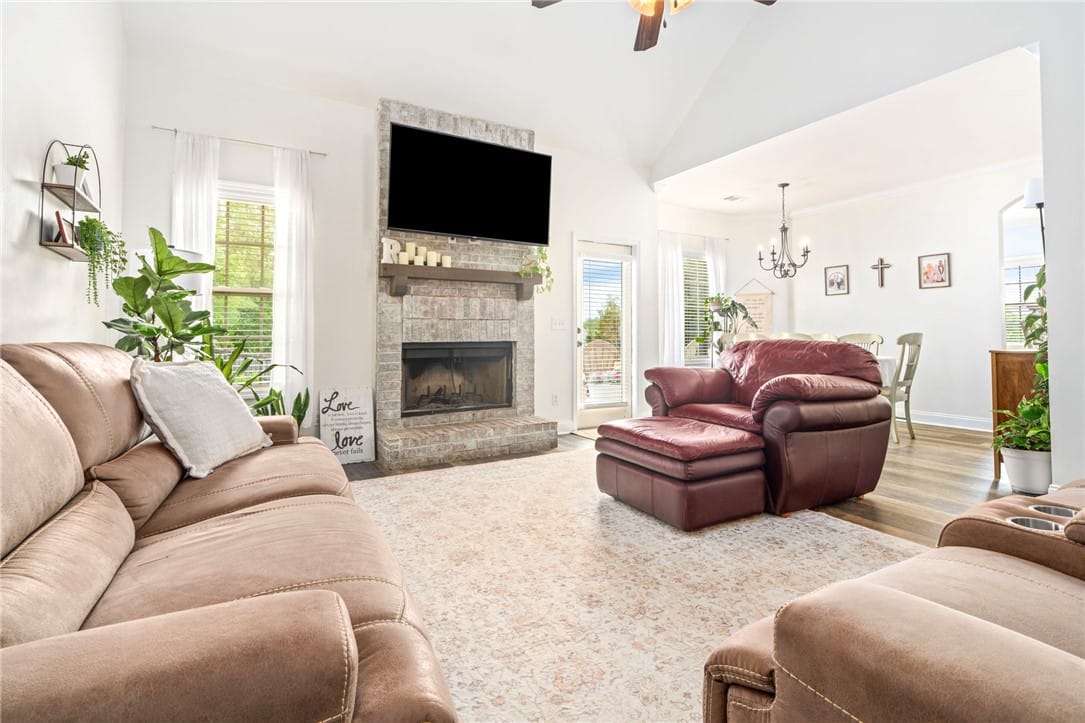 2902 Anderson Lakes Cir, Opelika, AL 36801, The living room showcases a vaulted ceiling and wo
