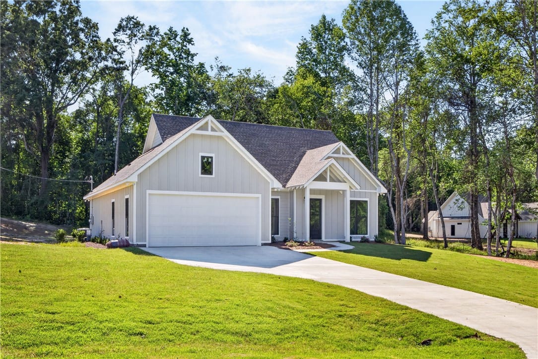 75 LEE ROAD 2058, Salem, AL, 36874, A newly constructed residence framed by mature tre