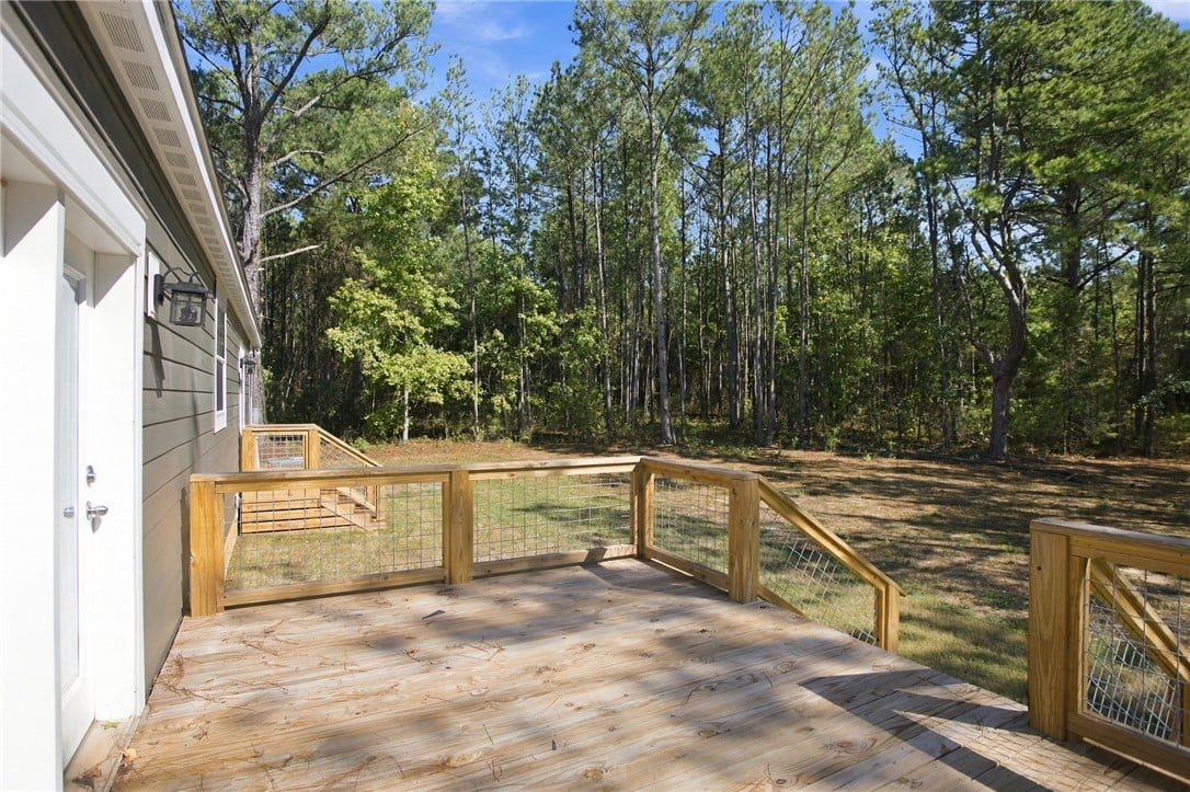 21849 Stillwaters Hwy, Tallassee, AL 36078, An elevated wood deck overlooks the expansive back