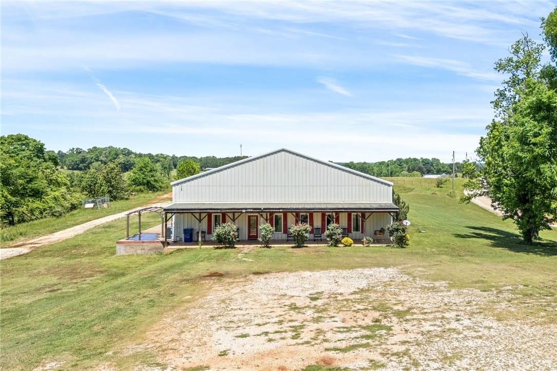 1049 County Rd 539, Valley, AL 36854, USA, This expansive rural property offers a wide front