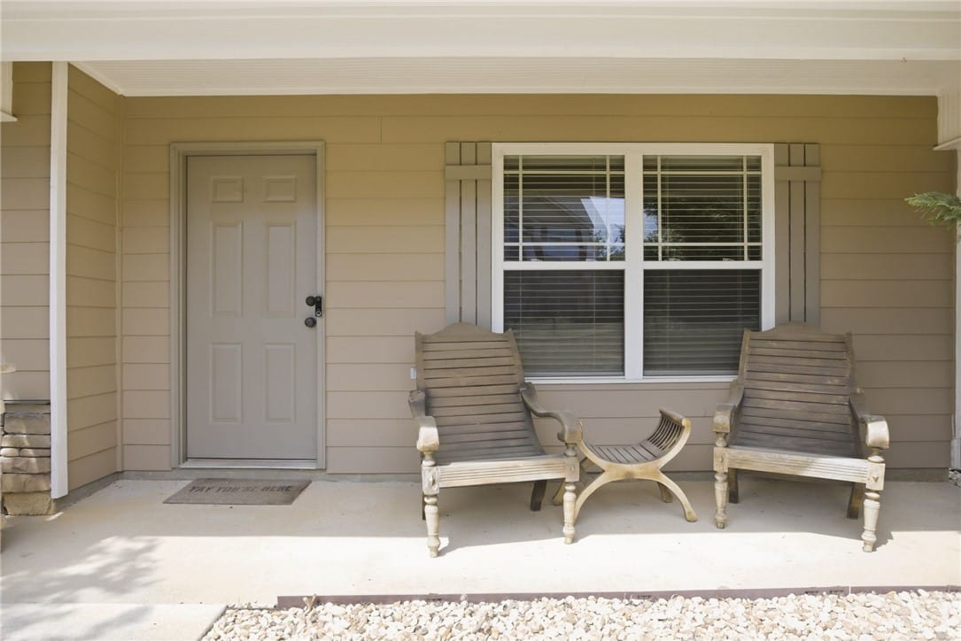 331 Frontier Cir, Auburn, AL 36832, This inviting covered porch provides a charming en