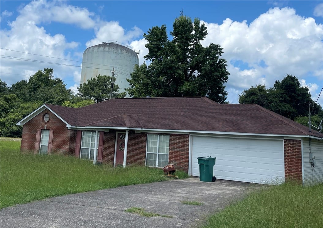 100 ANNA, Birmingham, AL, 35224, A brick facade residence features a driveway leadi
