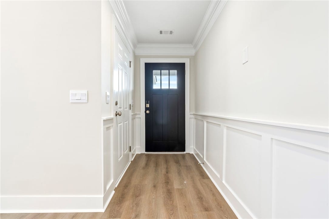 1717 Hidden Lks Dr, Opelika, AL 36801, USA, A welcoming entryway with refined wainscoting and