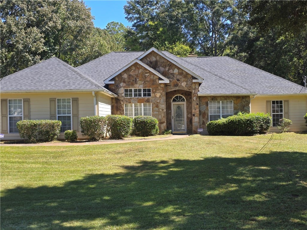2604 18th Pl, Valley, AL 36854, Natural stone accents and a sweeping green lawn fr