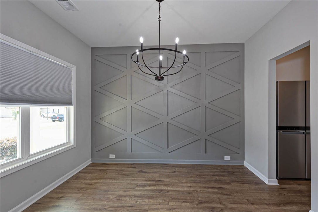 1050 Sawyer Dr, Opelika, AL 36801, Artisan geometric accent wall and modern chandelie