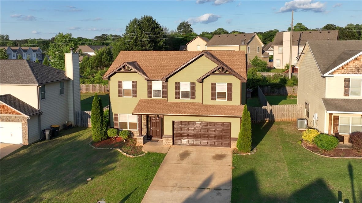 1401 Southwick Ln, Opelika, AL 36801, This charming home offers curb appeal and a welcom