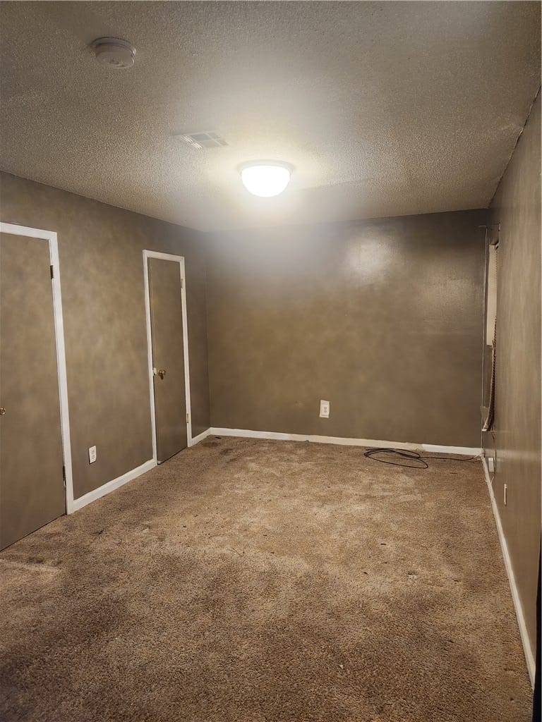1202 Washington St, Tuskegee, AL 36088, USA, This interior space features durable carpeting and
