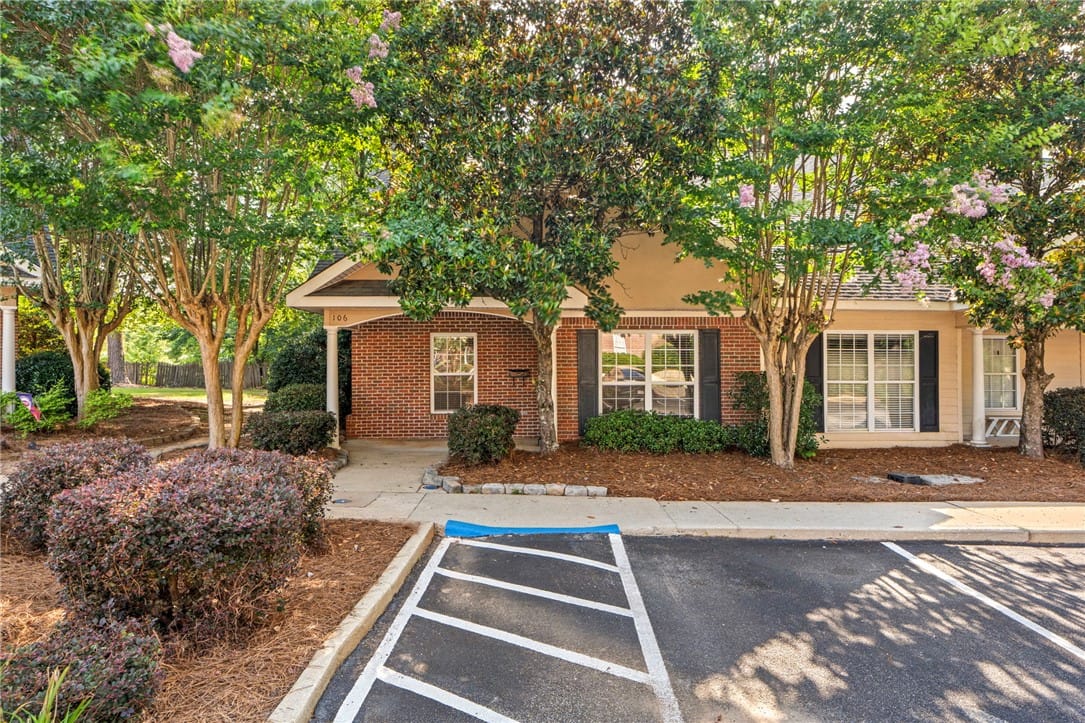 1515 Fitzpatrick Ave Apt 106, Opelika, AL 36801, A welcoming brick exterior is nestled among mature