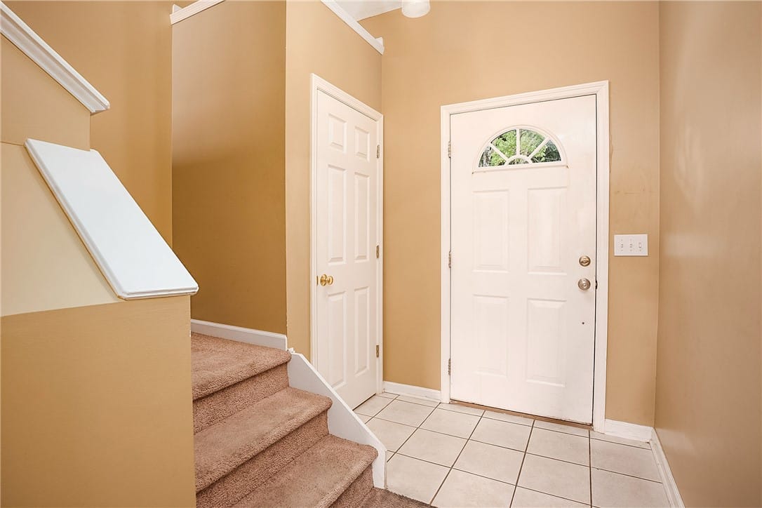 2428 E University Dr Apt 103, Auburn, AL 36830, Enter into a welcoming foyer with stairs leading t