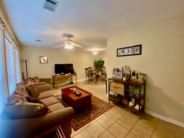Auburn, AL 36830, A tiled living room transitions smoothly into a di