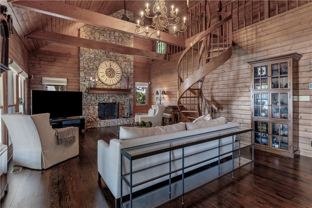 85 Briarwood Point, Dadeville, AL 36853, Rich wood paneling, a towering stone fireplace, an