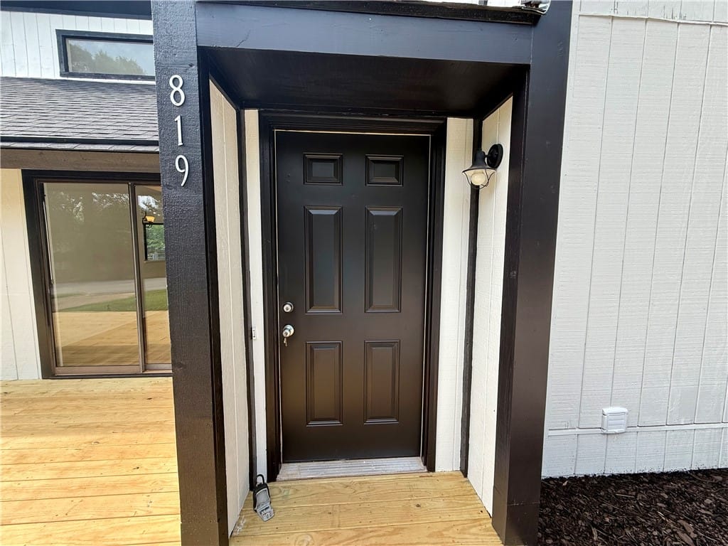 819 Chickasaw Ave, Auburn, AL 36830, A welcoming front entrance featuring a dark panele