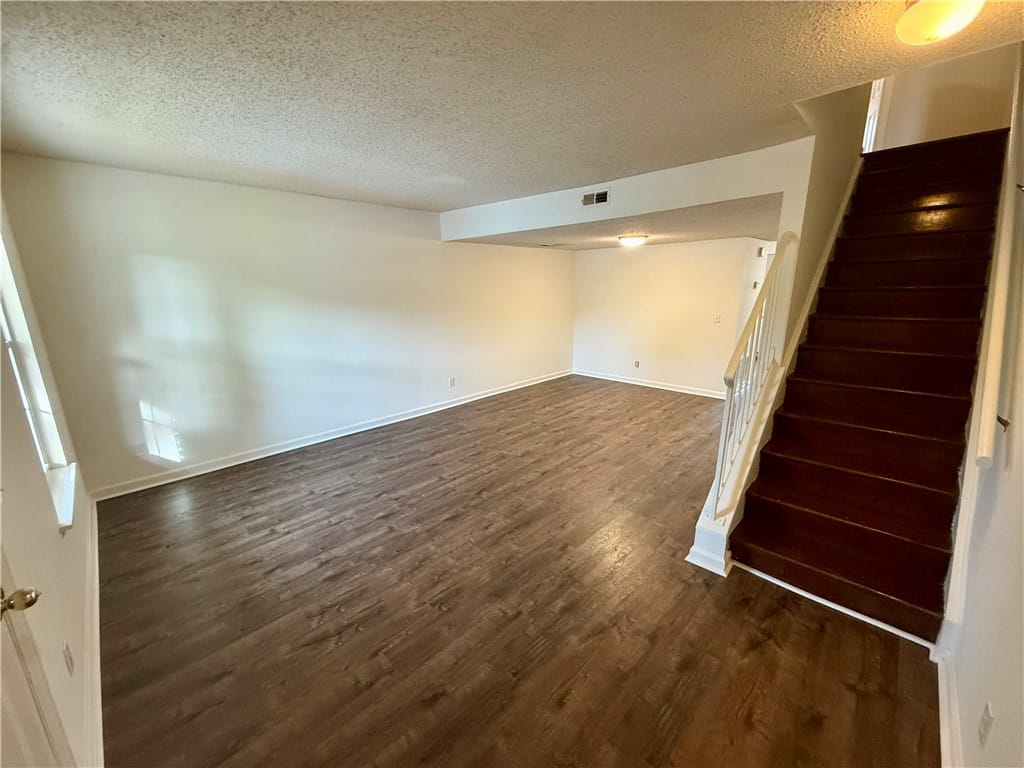 1761 Wire Rd #2-13, Auburn, AL 36832, A versatile open-concept living area with rich woo