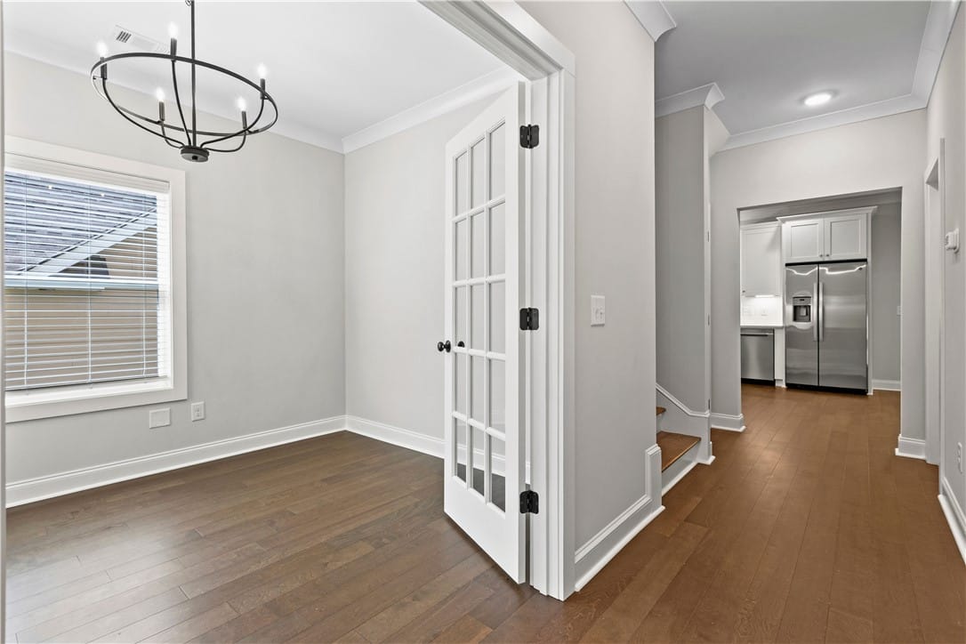428 Lightness Dr, Auburn, AL 36832, This versatile room features elegant French doors,