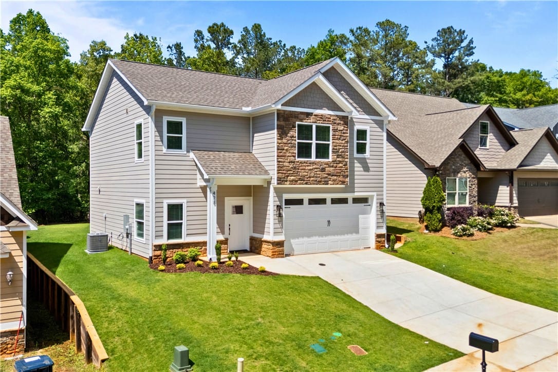 428 Lightness Dr, Auburn, AL 36832, This newly constructed residence showcases a conte