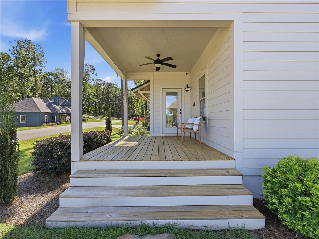 123 Village Trl, Dadeville, AL 36853, Inviting exterior steps lead up to a covered woode