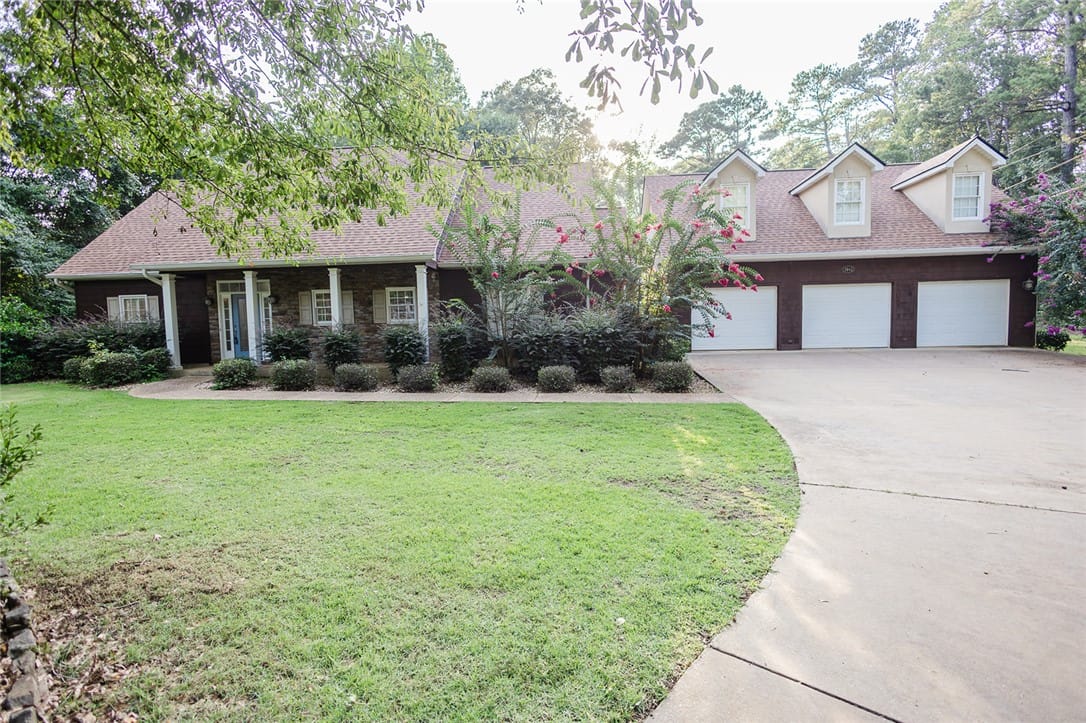 8943 Lee Rd 379, Valley, AL 36854, A classic brick-front residence with an attached t