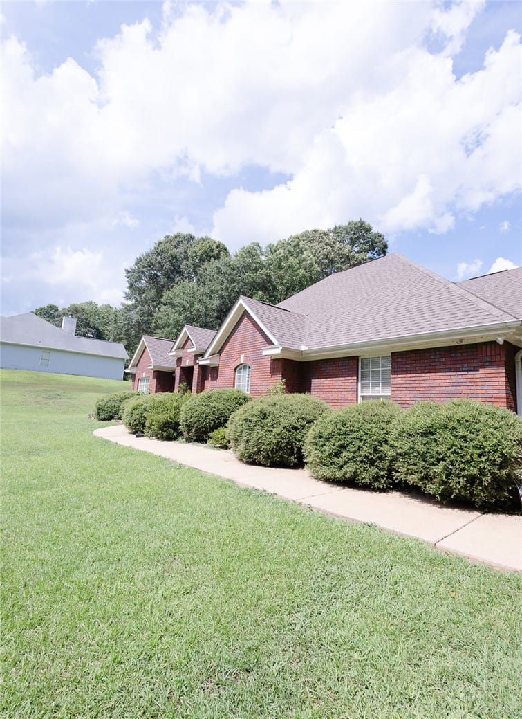 104 N 26th Ave, Lanett, AL 36863, A classic brick exterior offers enduring charm, co