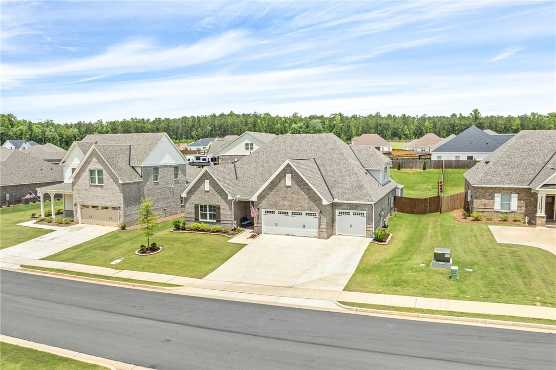 1474 Maggie Dr, Opelika, AL 36801, A classic brick exterior graces this residential p