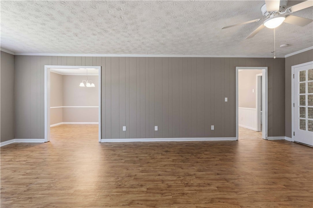 6554 Lemans Ln, Columbus, GA 31909, USA, Natural wood flooring complements the serene wall