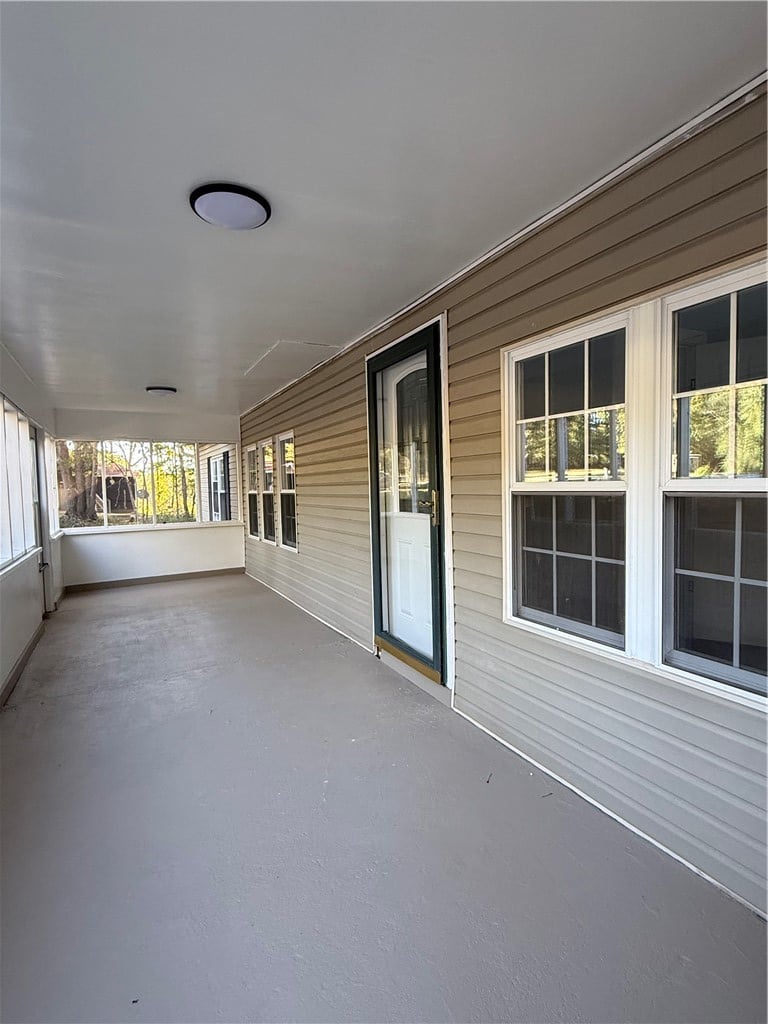 268 Lee Road 186, Opelika, AL 36804, A long covered porch features solid flooring and m